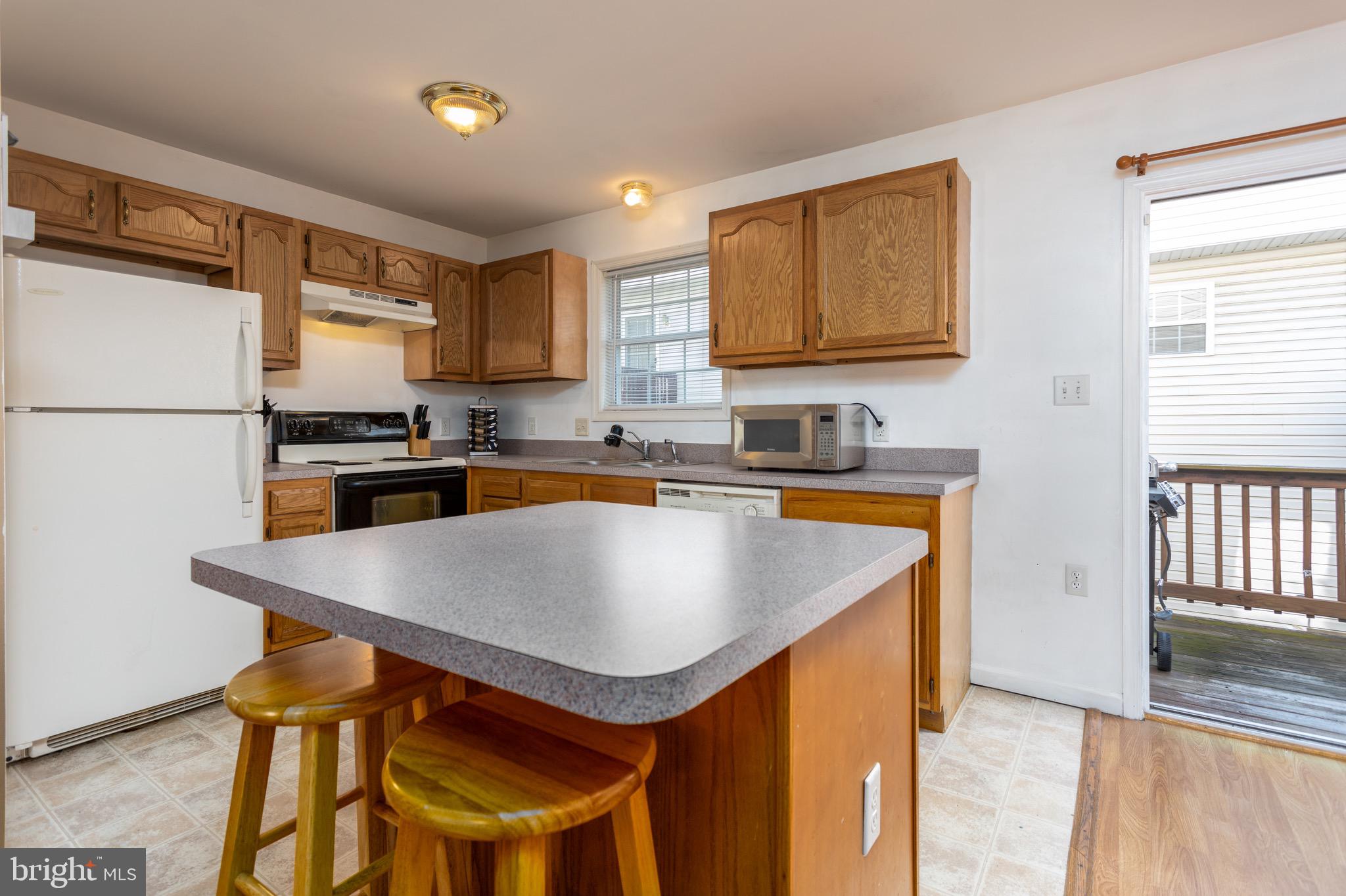 123 North Marshall Street Ranson, WV 25438 - Photo 9 of 28 Kitchen with island and seating for 2