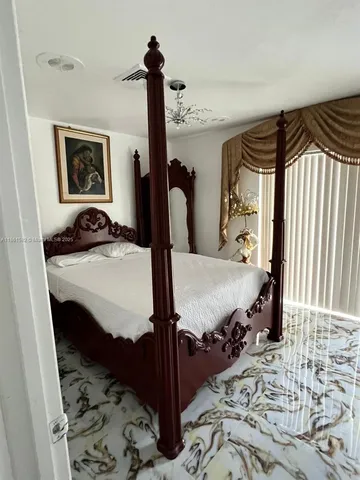 a view of a balcony with chairs