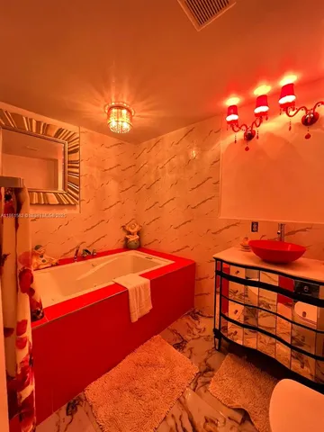 a bathroom with a sink and a toilet