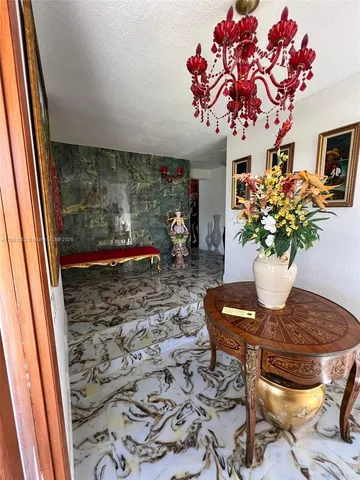 a vase of flowers sitting on a table