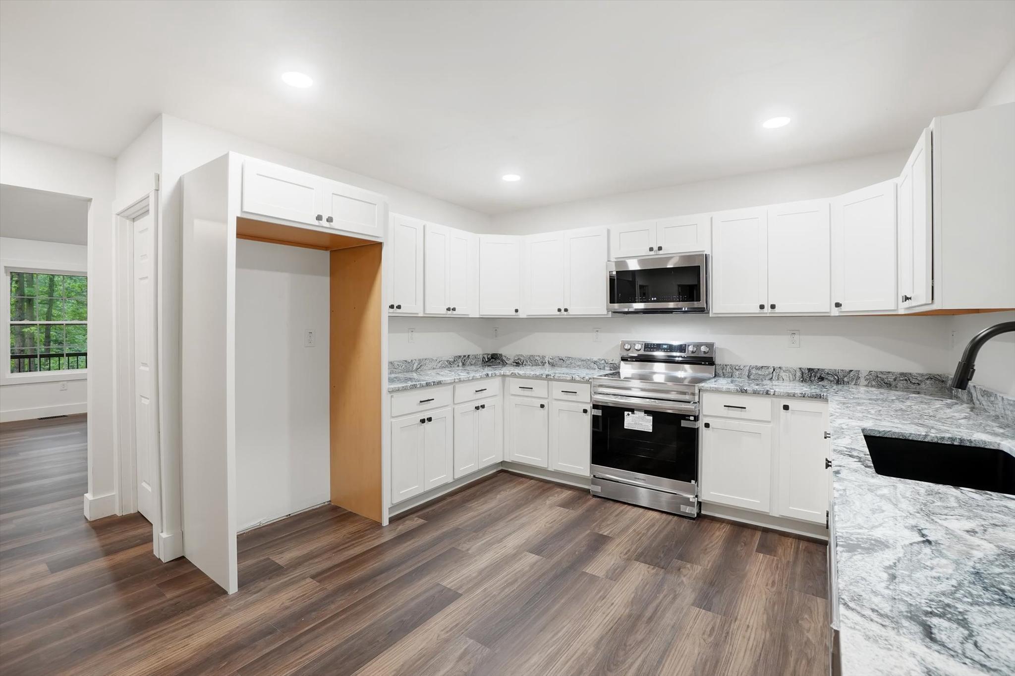 18985 Hebel Road Stewartstown, PA 17363 - Photo 17 of 42 Modern kitchen with sleek finishes.