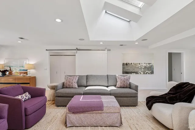 a living room with furniture and a couch