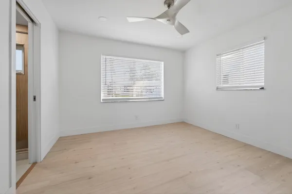 an empty room with windows