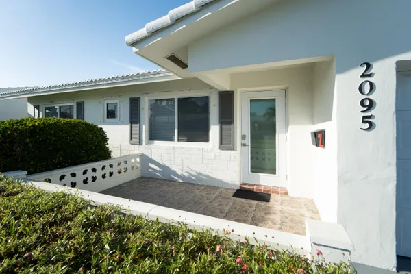 a front view of a house with windows