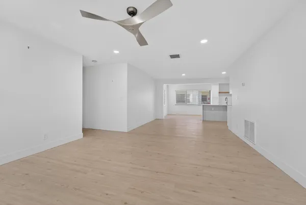 a view of kitchen and windows