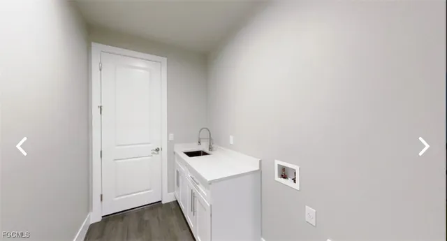 a bathroom with a sink a mirror and a bathtub