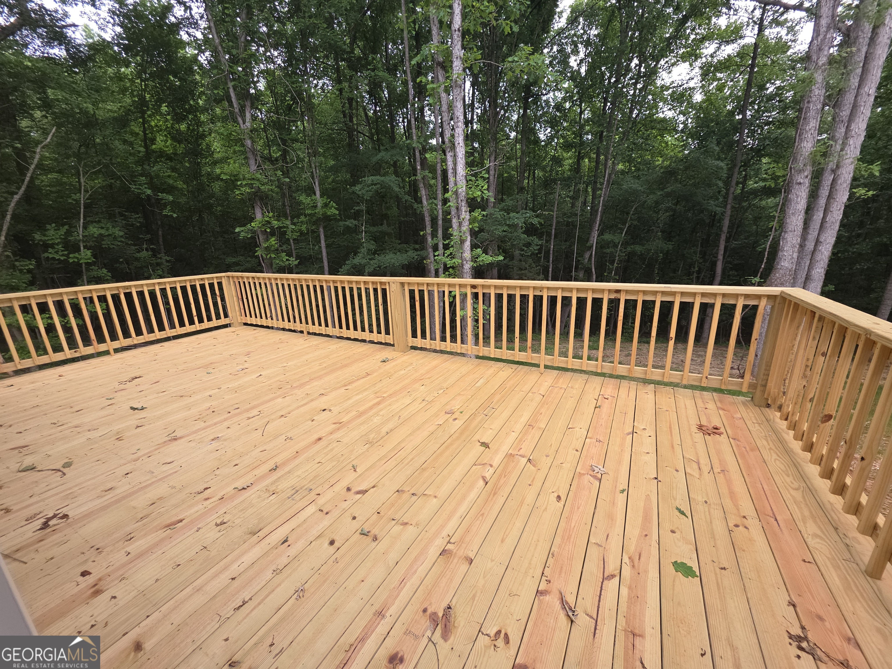 546 Hargrove Lake Road, Unit 2B Arnoldsville, GA 30619 - Photo 14 of 14 a balcony with trees