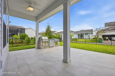 a view of a house with a yard and garage