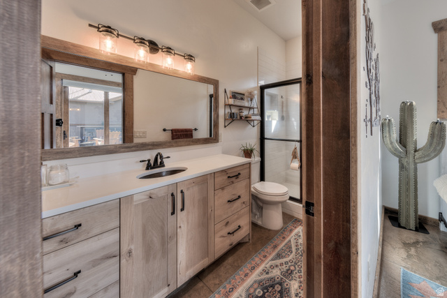 4173 Shadowfax Run, Unit 5 Moab, UT 84532 - Photo 31 of 41 Full bath featuring polished Quartz countertop, copper undermount sink and tiled walk-in shower