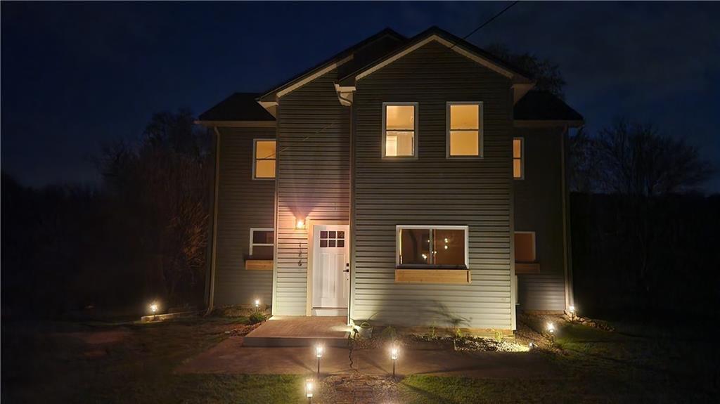 176 Duncan Road Harrisville, PA 16038 - Photo 3 of 48 Night time view w solar landscape lighting