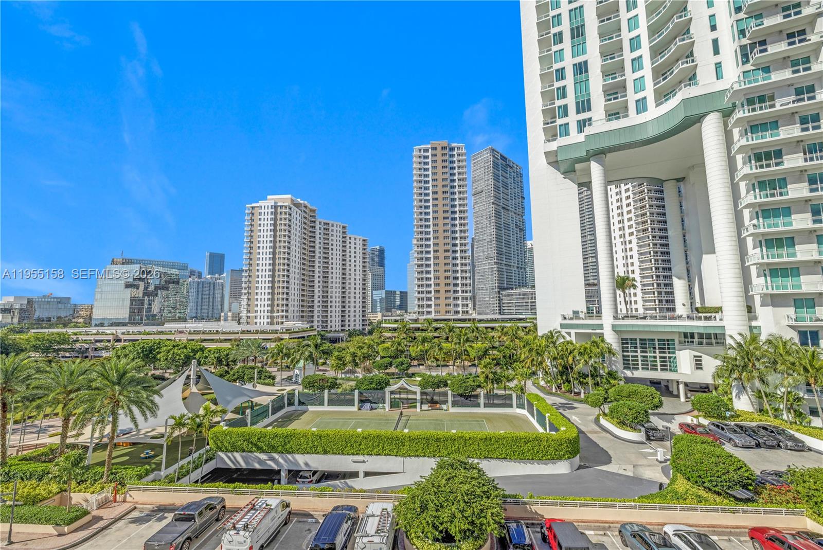 888 Brickell Key Drive, Unit 701 Miami, FL 33131 - Photo 9 of 20 a view of a city with tall buildings