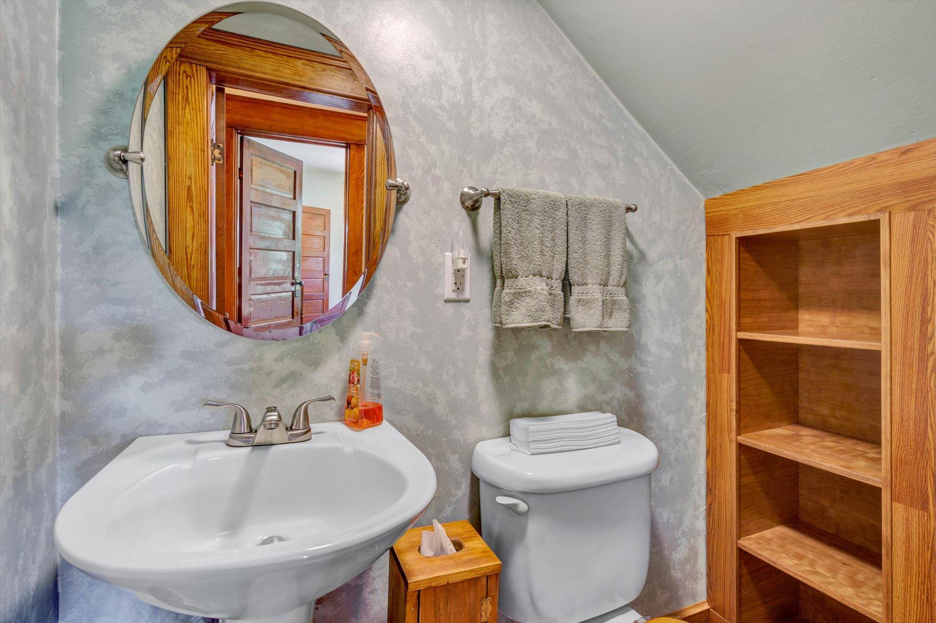 3567 Dillons Mill Road Callaway, VA 24067 - Photo 12 of 37 a bathroom with a toilet sink and mirror