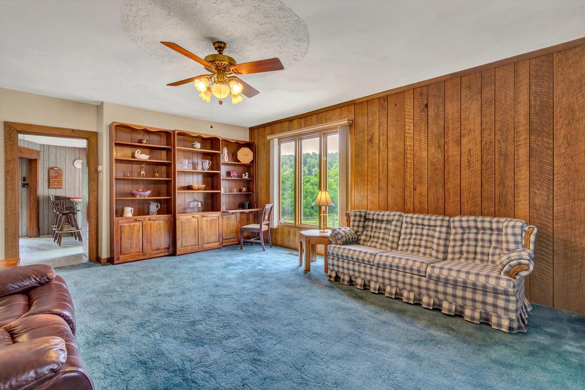 3567 Dillons Mill Road Callaway, VA 24067 - Photo 15 of 37 a living room with furniture and a ceiling fan