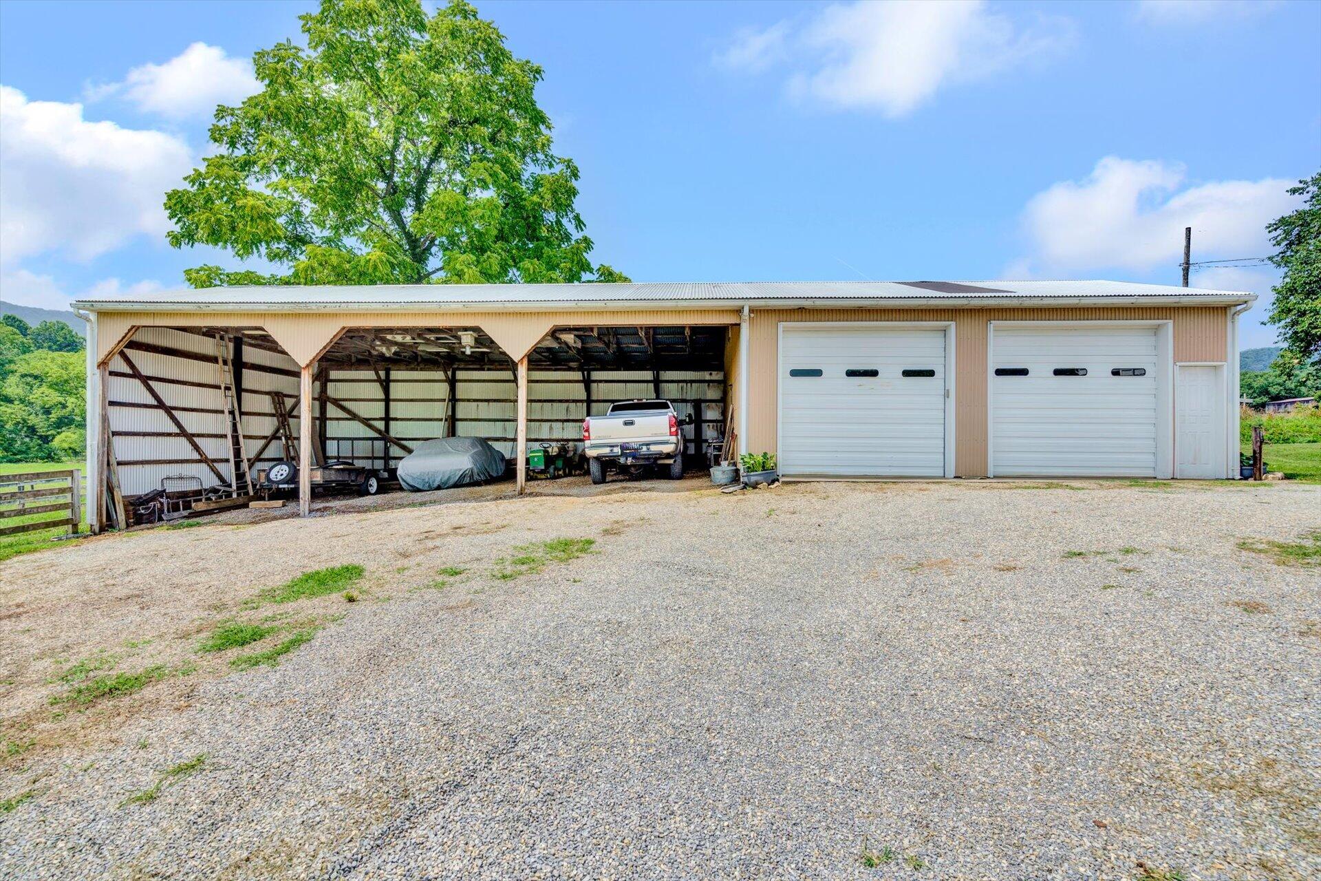 3567 Dillons Mill Road Callaway, VA 24067 - Photo 34 of 37 a front view of a house with a yard and garage