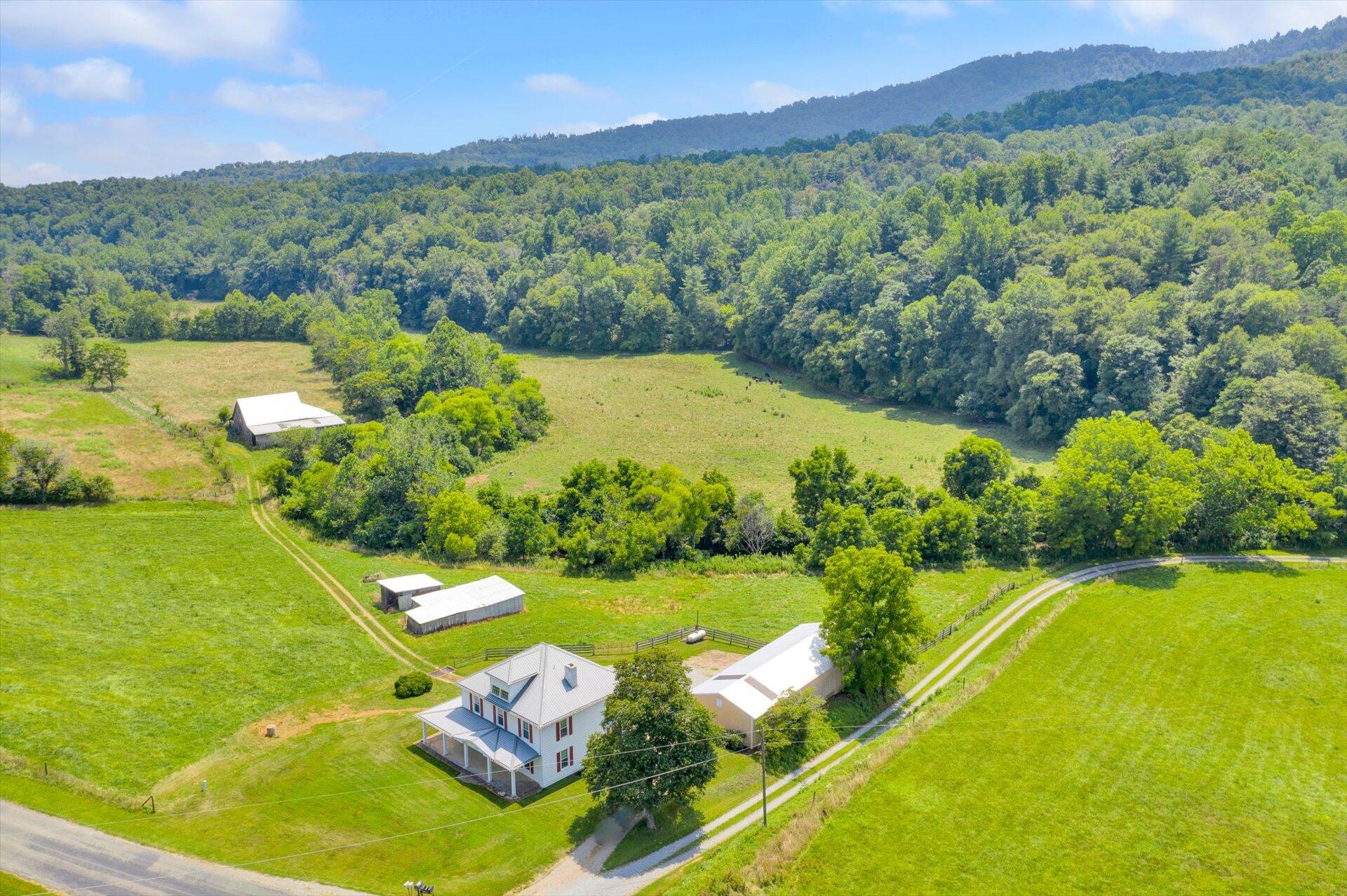 3567 Dillons Mill Road Callaway, VA 24067 - Photo 6 of 37 a view of a city with mountains in the background