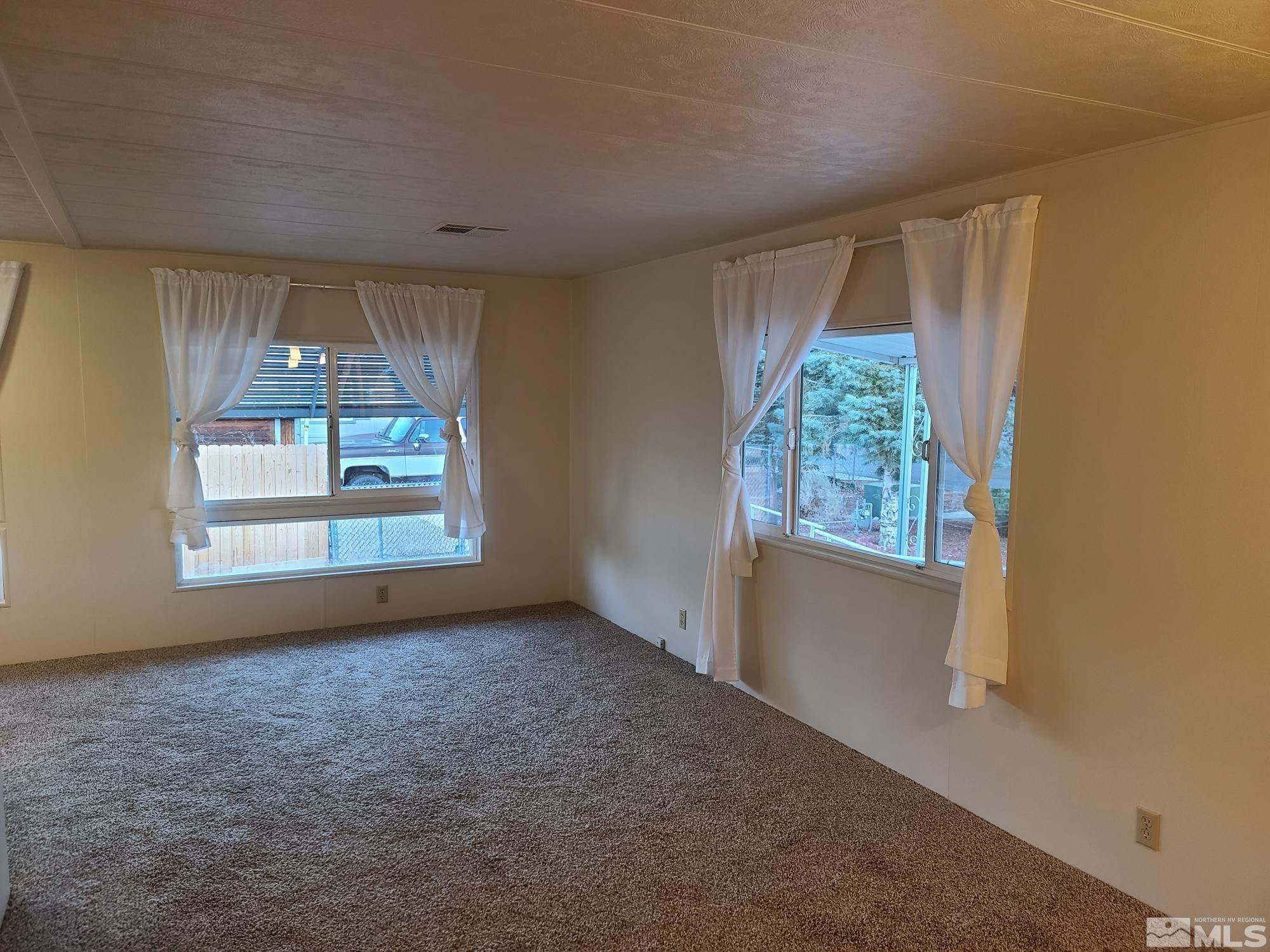 315 Capella Drive Reno, NV 89521 - Photo 11 of 15 a view of an empty room with a window