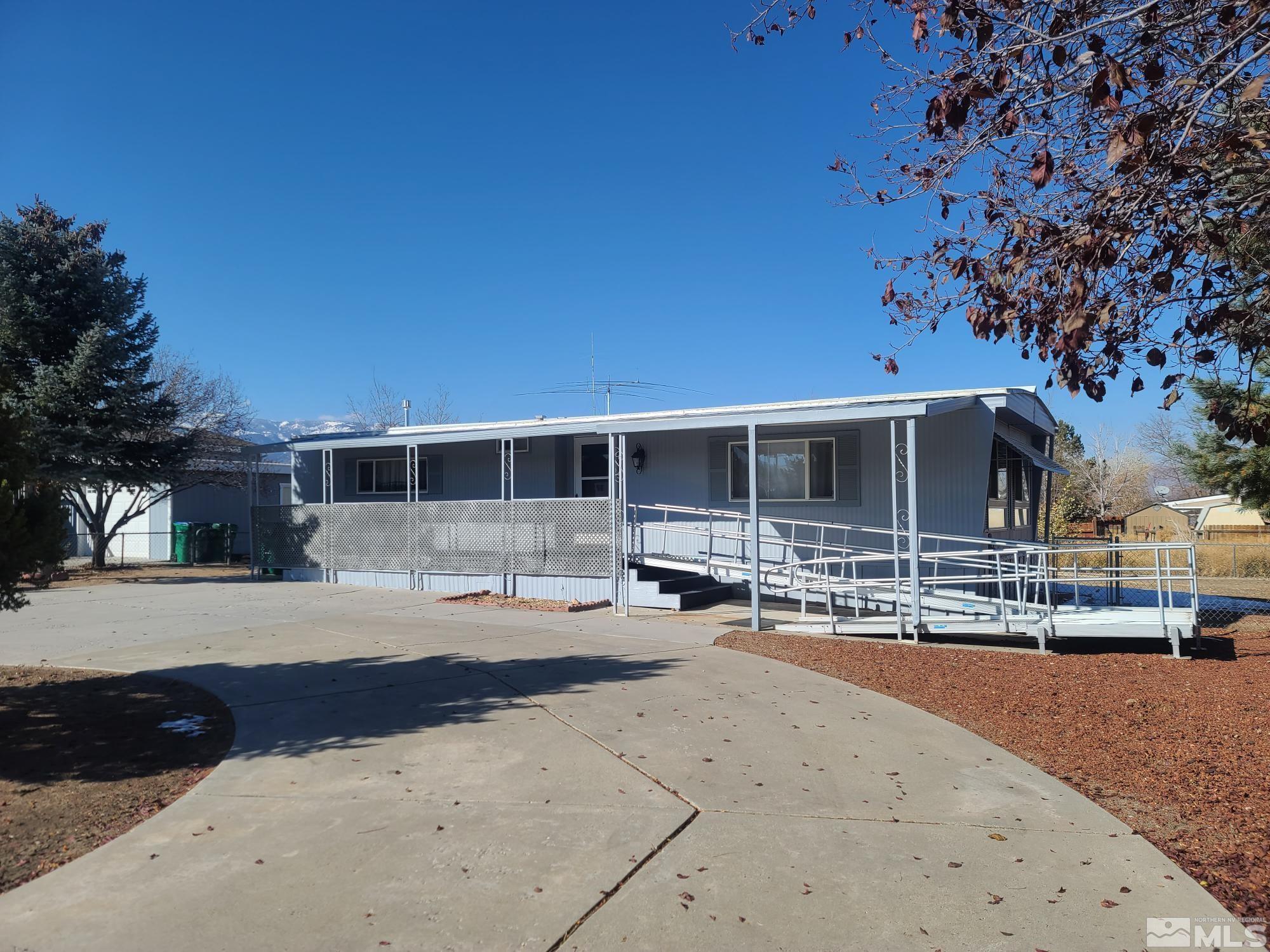 315 Capella Drive Reno, NV 89521 - Photo 2 of 15 a front view of a house with a yard