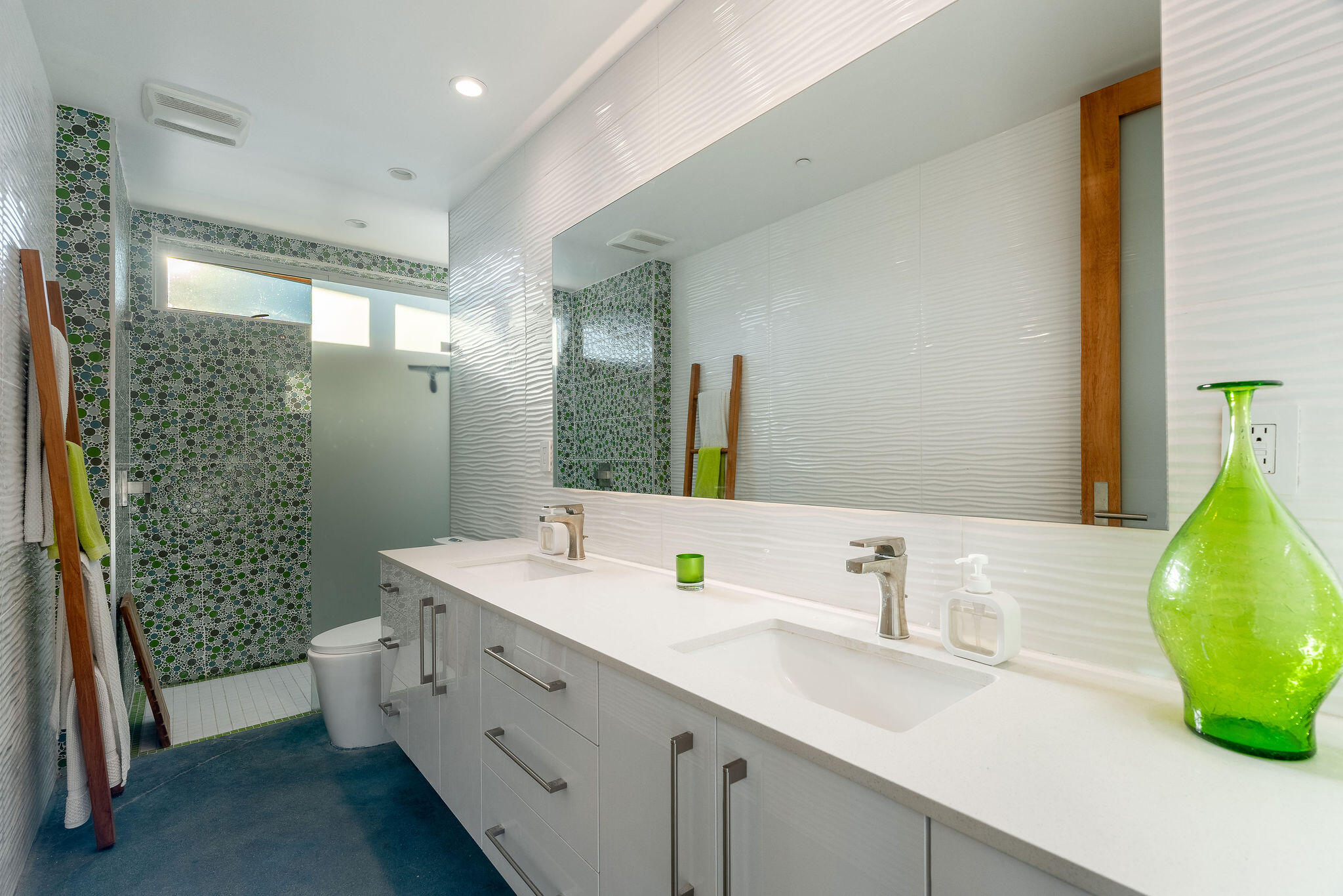 53145 Northridge Road Morongo Valley, CA 92256 - Photo 18 of 48 a bathroom with a double vanity sink mirror and shower