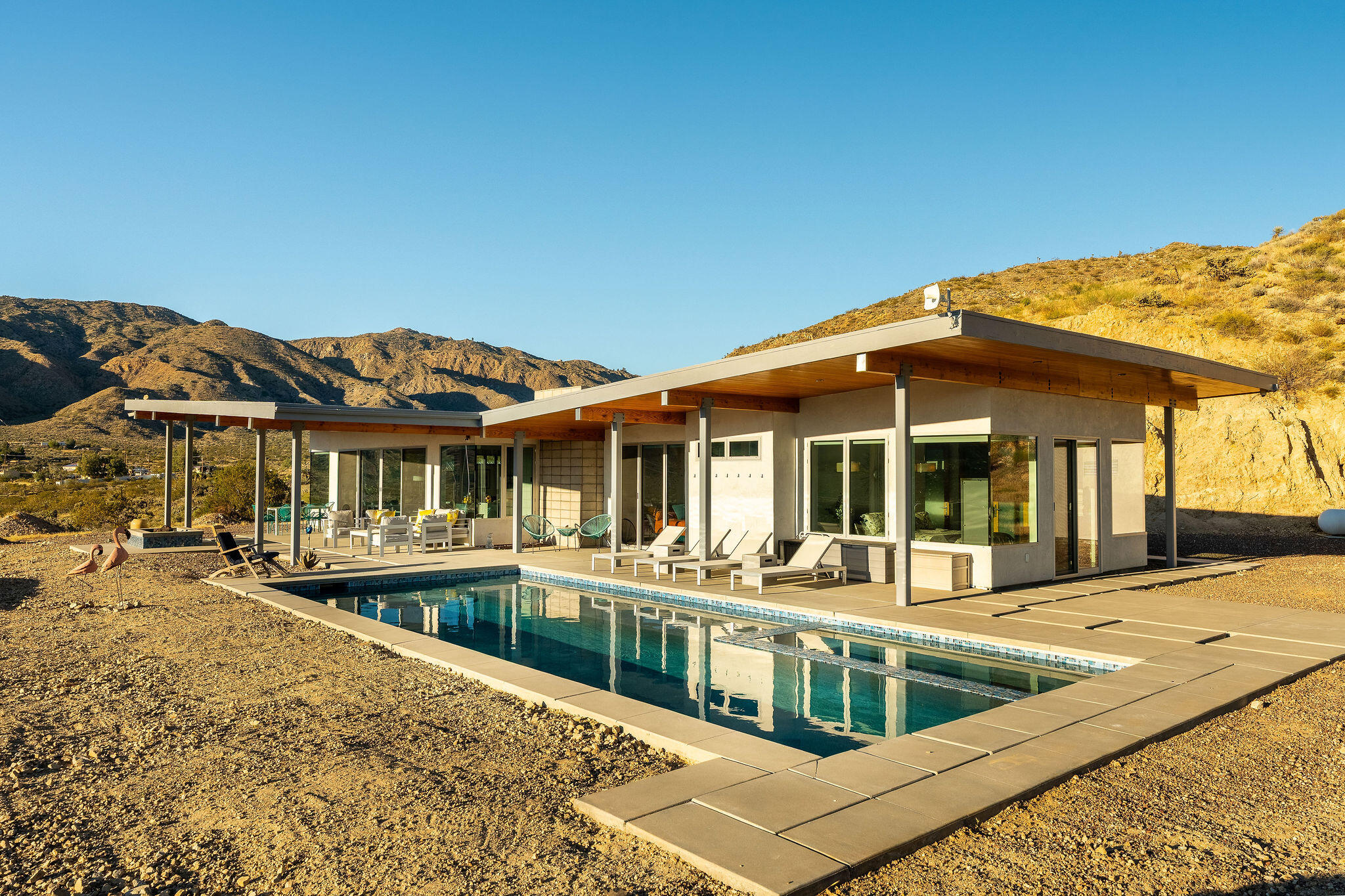 53145 Northridge Road Morongo Valley, CA 92256 - Photo 30 of 48 front view of a house with a swimming pool