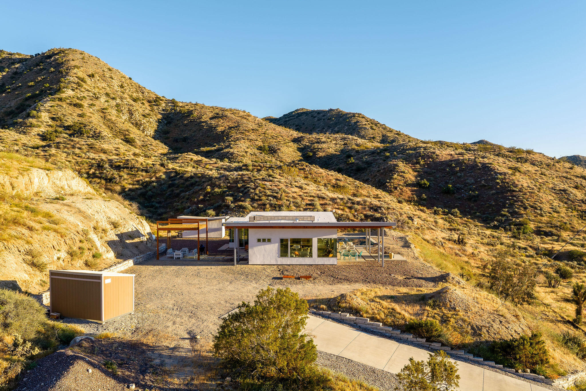 53145 Northridge Road Morongo Valley, CA 92256 - Photo 39 of 48 a front view of a house with a yard