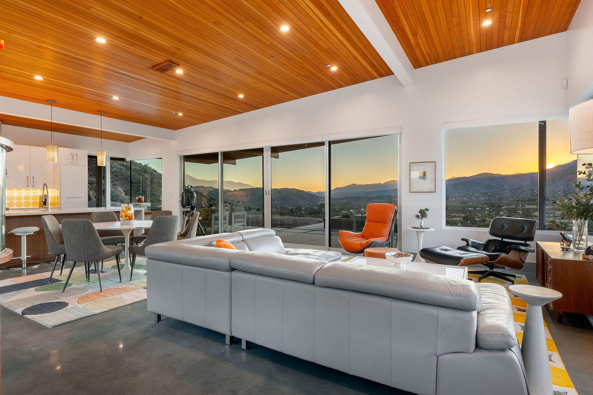 53145 Northridge Road Morongo Valley, CA 92256 - Photo 4 of 48 a living room with furniture and a floor to ceiling window