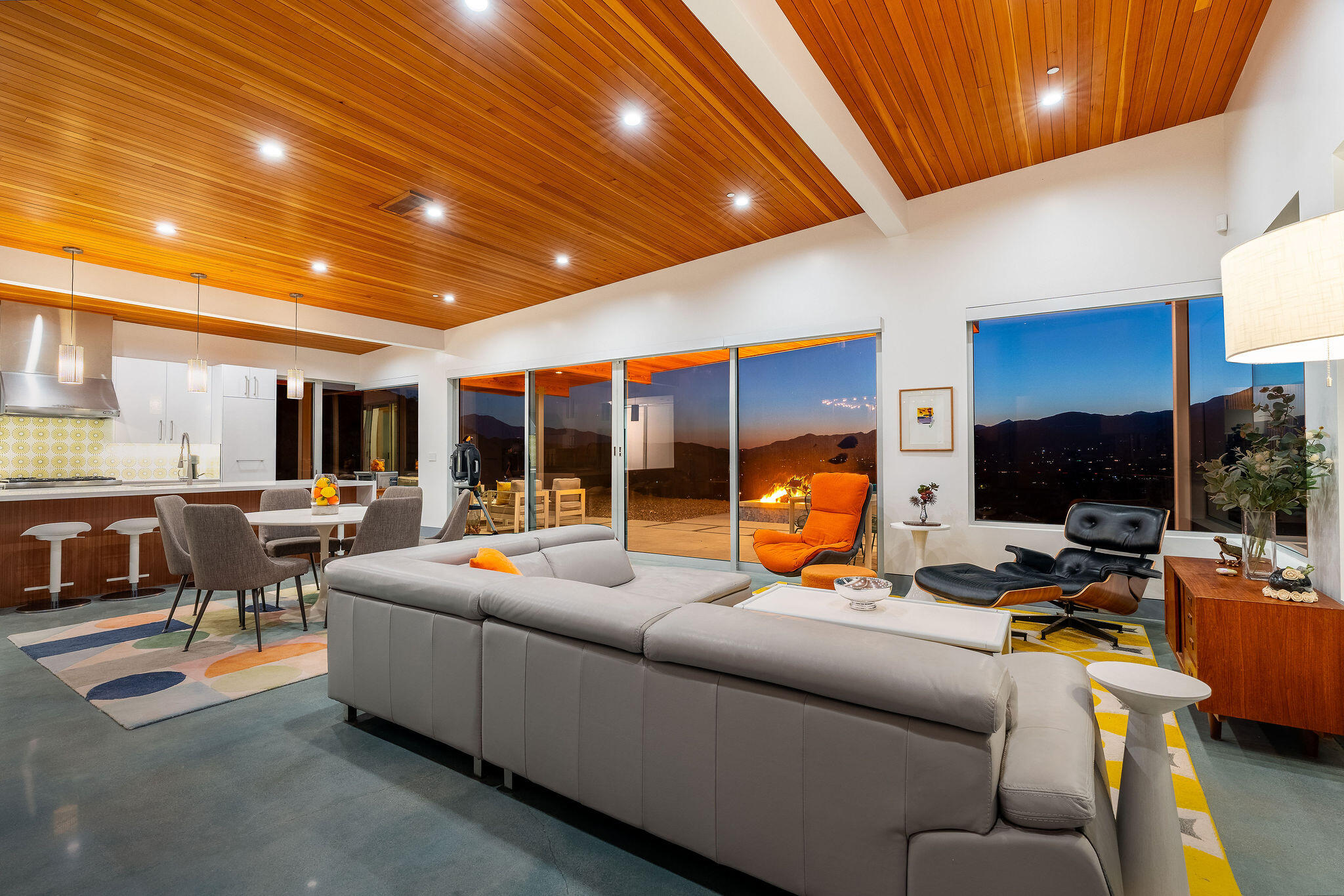 53145 Northridge Road Morongo Valley, CA 92256 - Photo 5 of 48 a living room with furniture kitchen view and a large window