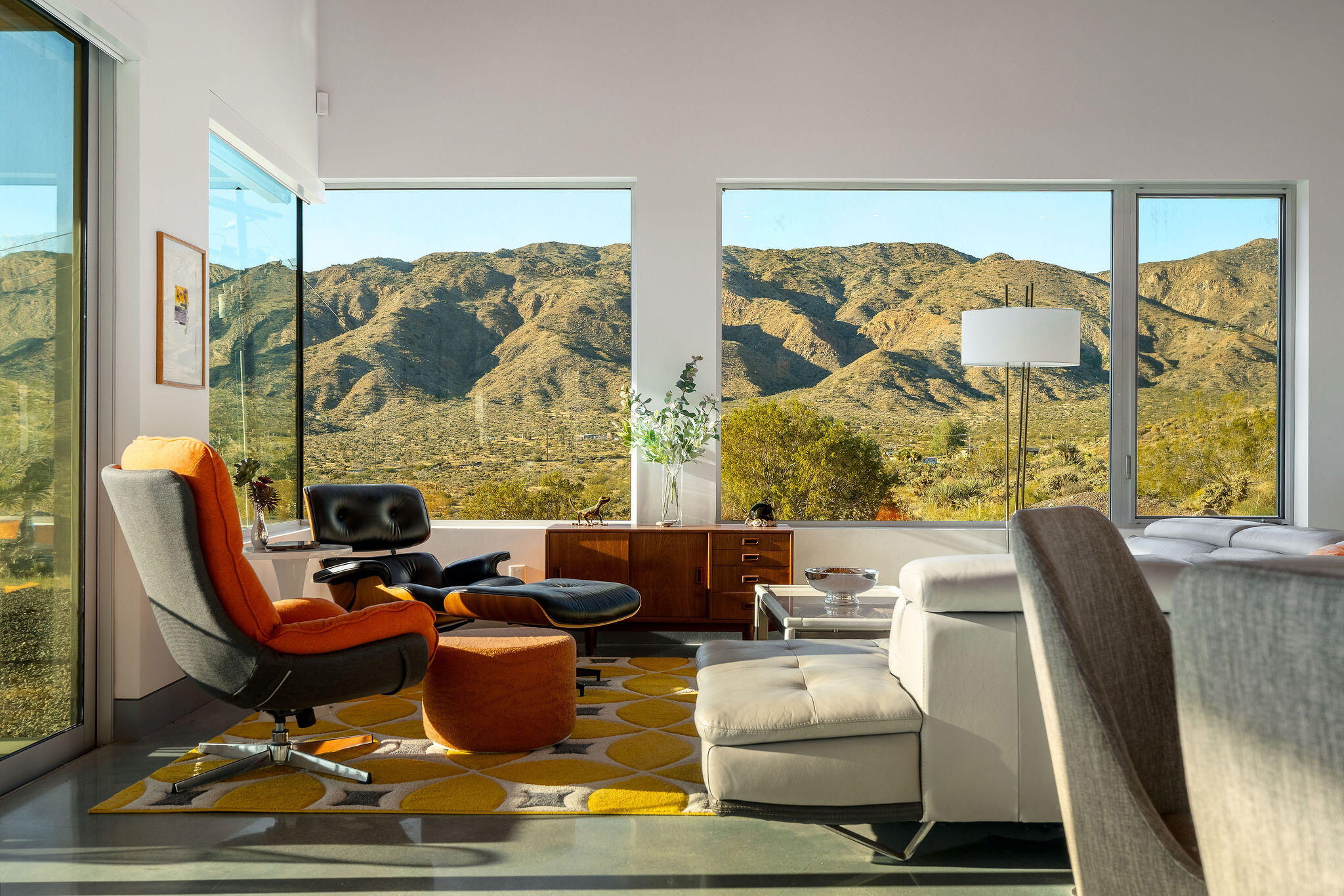 53145 Northridge Road Morongo Valley, CA 92256 - Photo 7 of 48 a living room with fireplace furniture and a floor to ceiling window