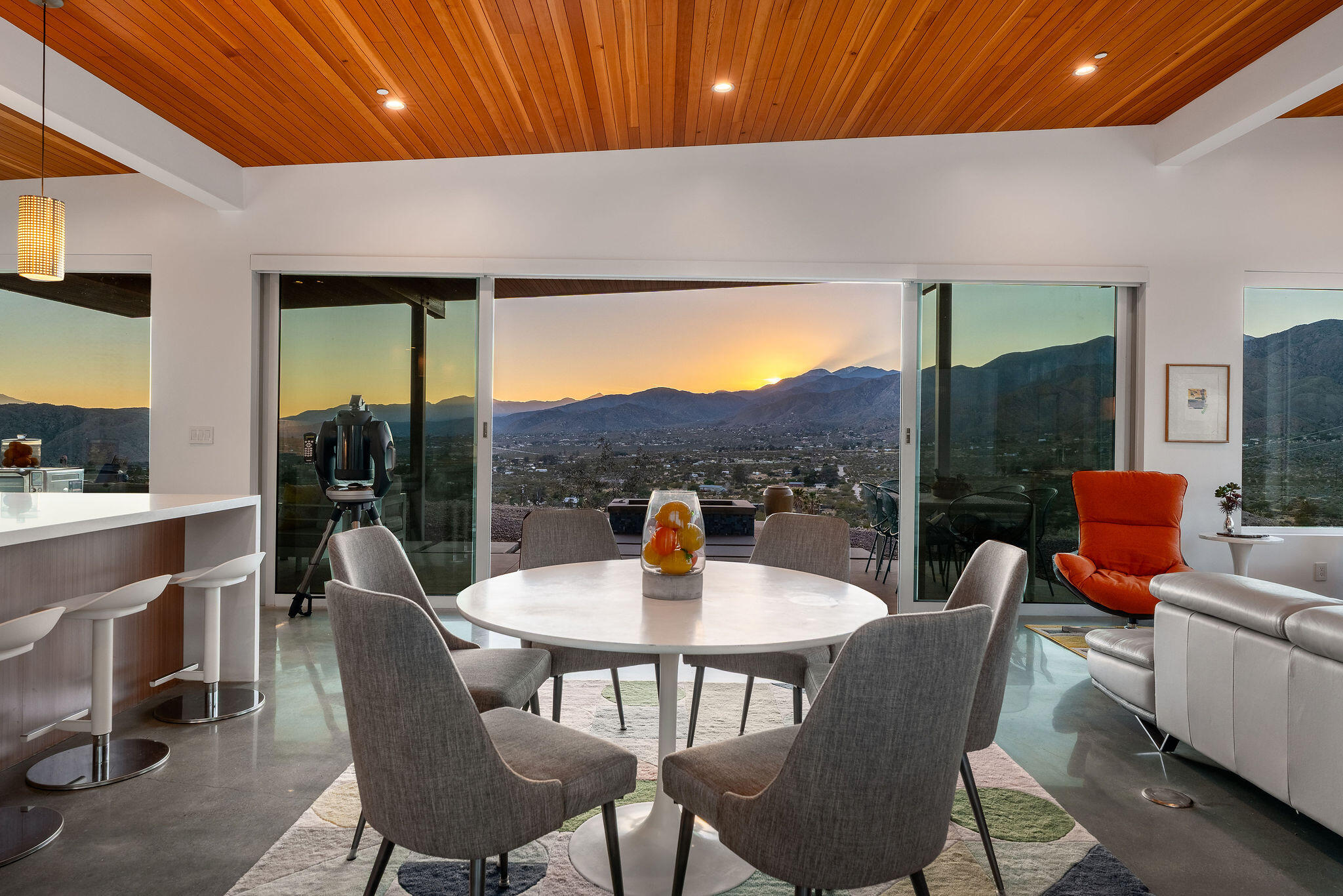 53145 Northridge Road Morongo Valley, CA 92256 - Photo 8 of 48 a dining room with furniture and a floor to ceiling window