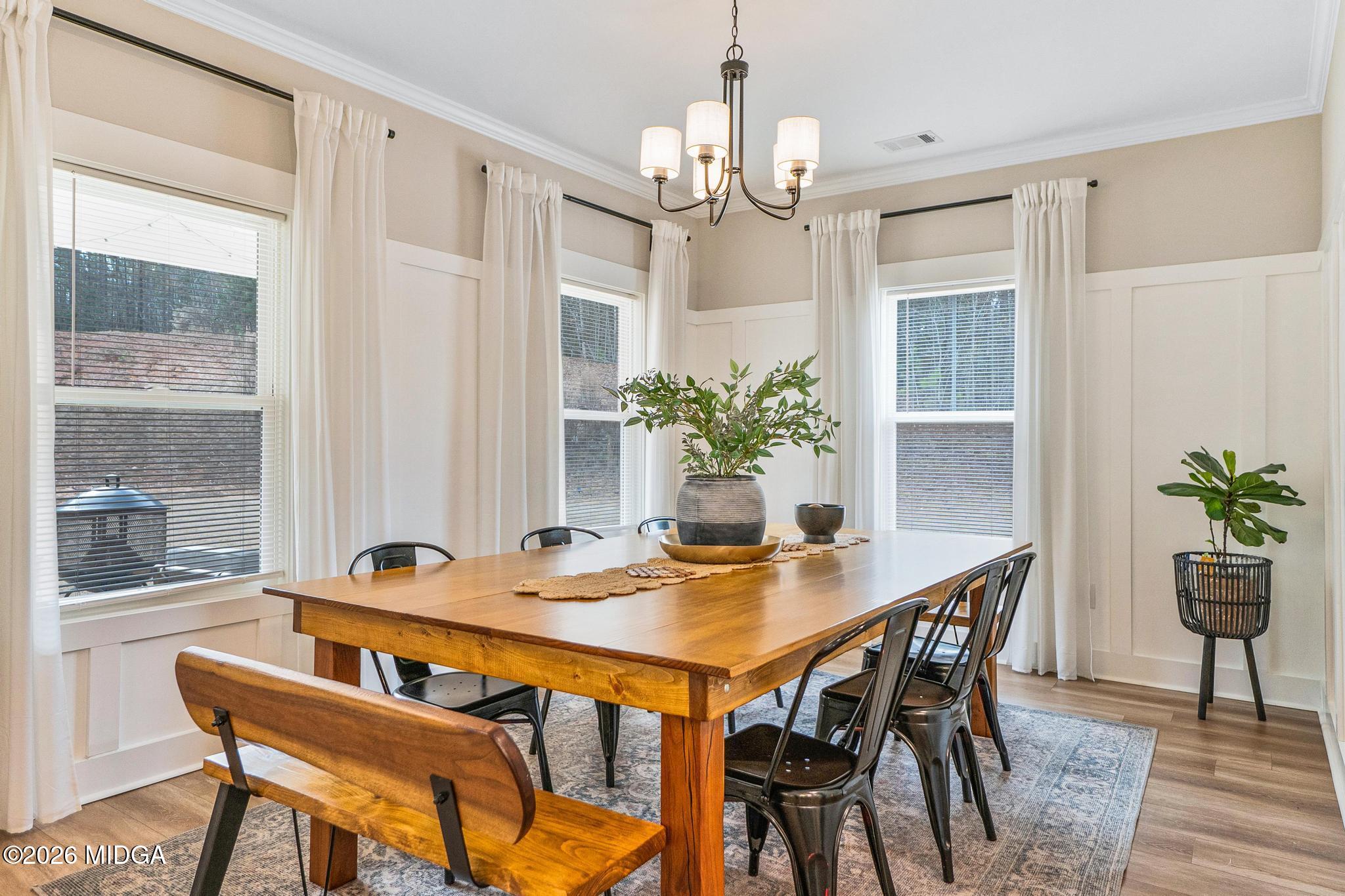 155 Creekside Lane Forsyth, GA 31029 - Photo 17 of 43 a view of a dining room with furniture and window
