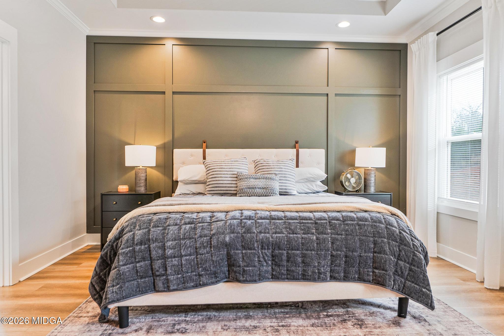 155 Creekside Lane Forsyth, GA 31029 - Photo 18 of 43 a bedroom with a bed and a window