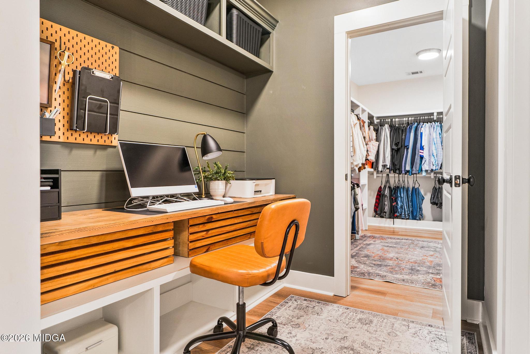 155 Creekside Lane Forsyth, GA 31029 - Photo 24 of 43 a room with furniture and a rug