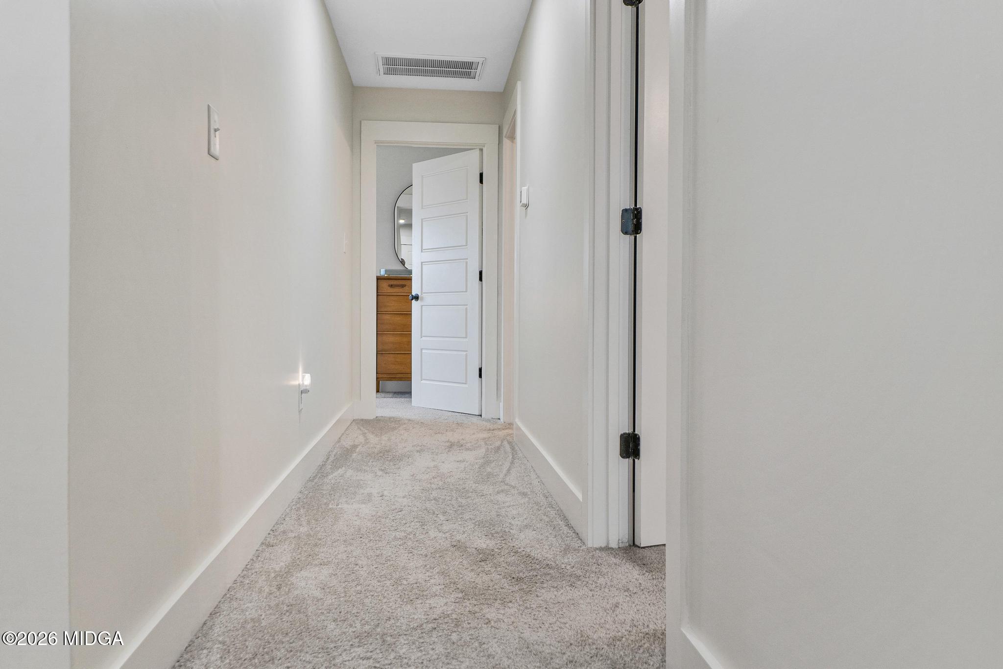 155 Creekside Lane Forsyth, GA 31029 - Photo 27 of 43 view of a room with a hallway