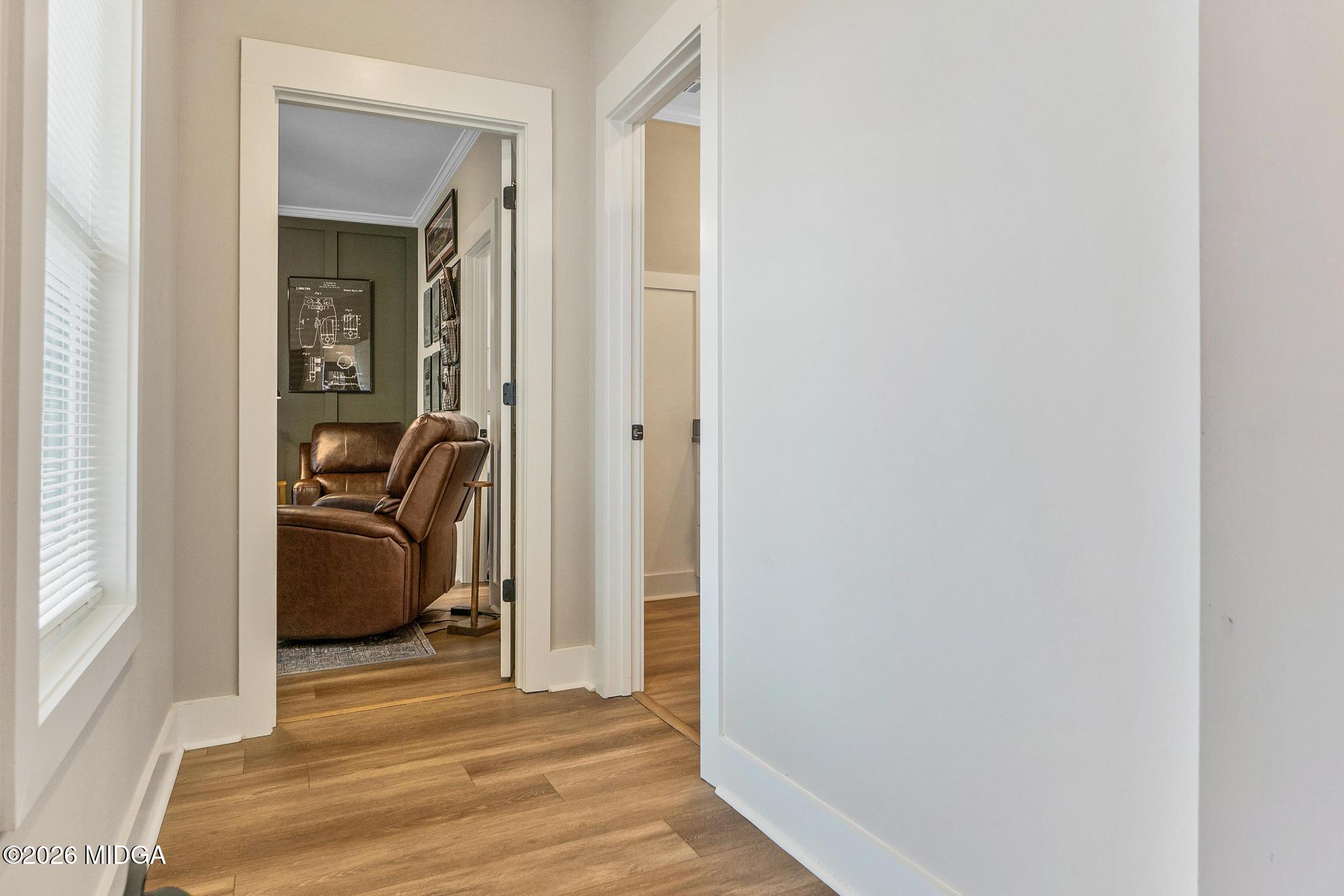 155 Creekside Lane Forsyth, GA 31029 - Photo 3 of 43 a view of a bedroom from a corridor