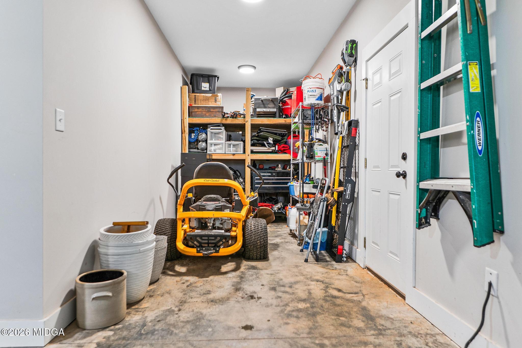 155 Creekside Lane Forsyth, GA 31029 - Photo 38 of 43 a view of storage and utility room