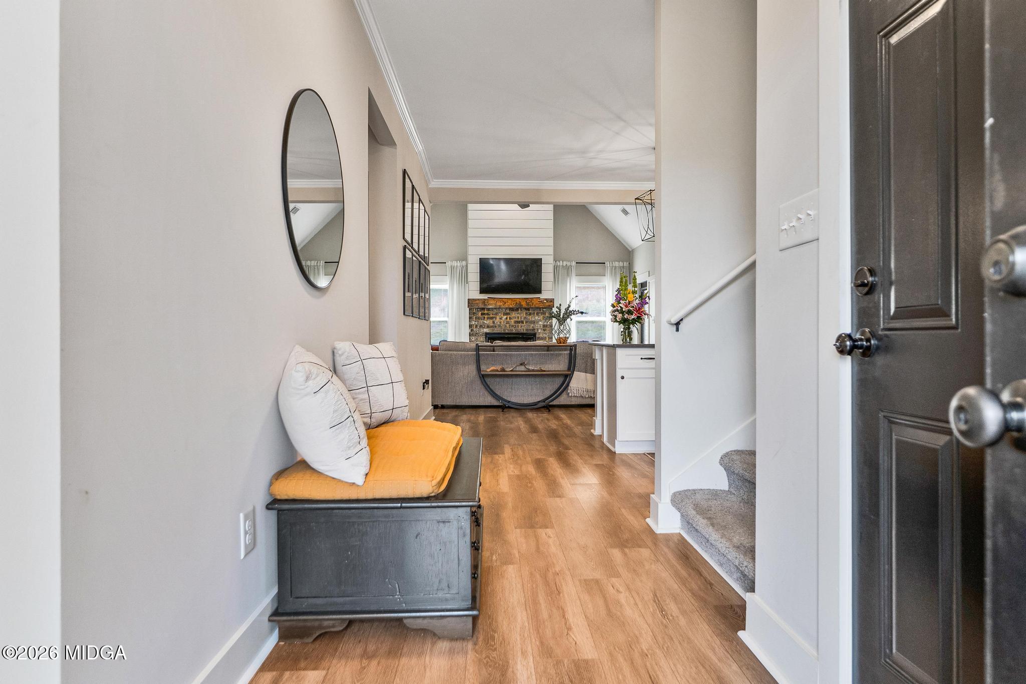 155 Creekside Lane Forsyth, GA 31029 - Photo 4 of 43 a view of living room with furniture and wooden floor