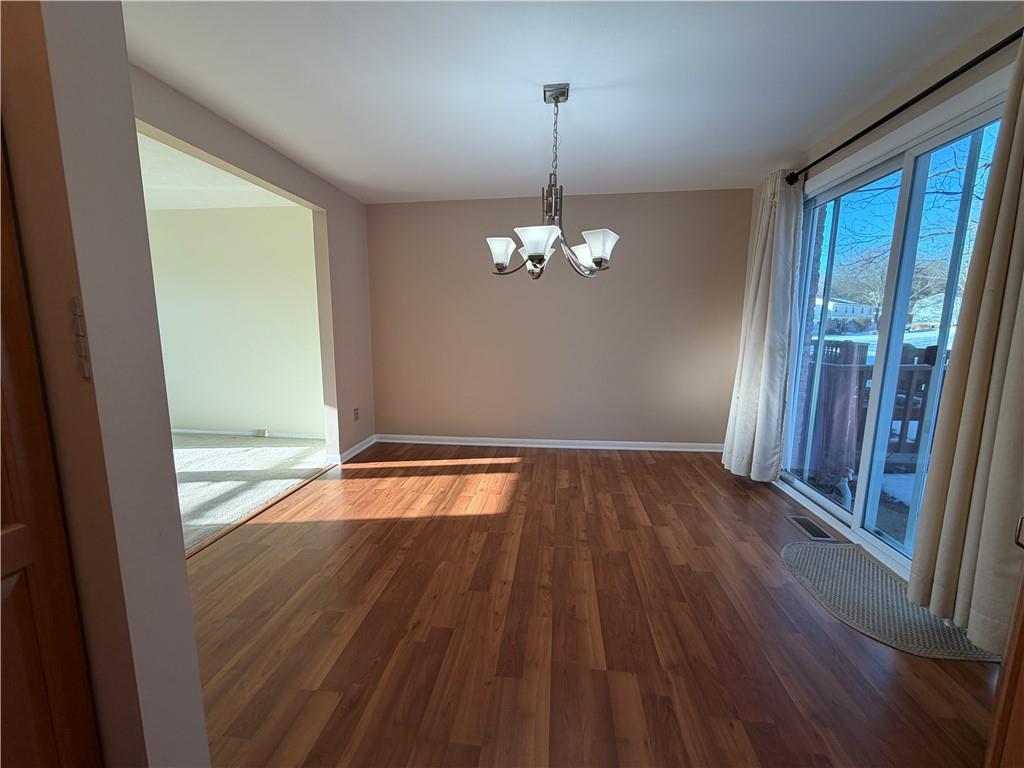 216 Quail Run Road Venetia, PA 15367 - Photo 7 of 28 Dining room adjacent to the kitchen and living room. Sliding gla