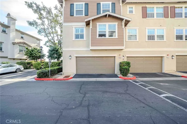 a view of road and garage