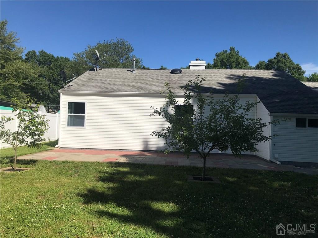 42 Kenmore Road Edison, NJ 08817 - Photo 11 of 14 a view of a house with a yard