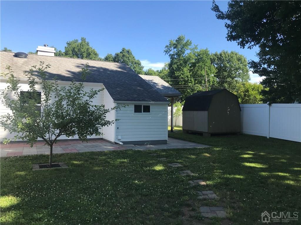 42 Kenmore Road Edison, NJ 08817 - Photo 12 of 14 a house view with a garden space