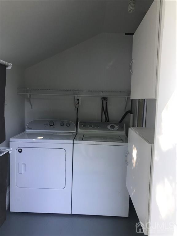 42 Kenmore Road Edison, NJ 08817 - Photo 13 of 14 a close view of laundry room with furniture and lamp