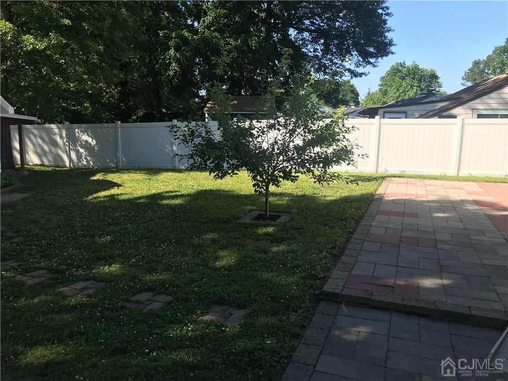 42 Kenmore Road Edison, NJ 08817 - Photo 9 of 14 a view of a backyard