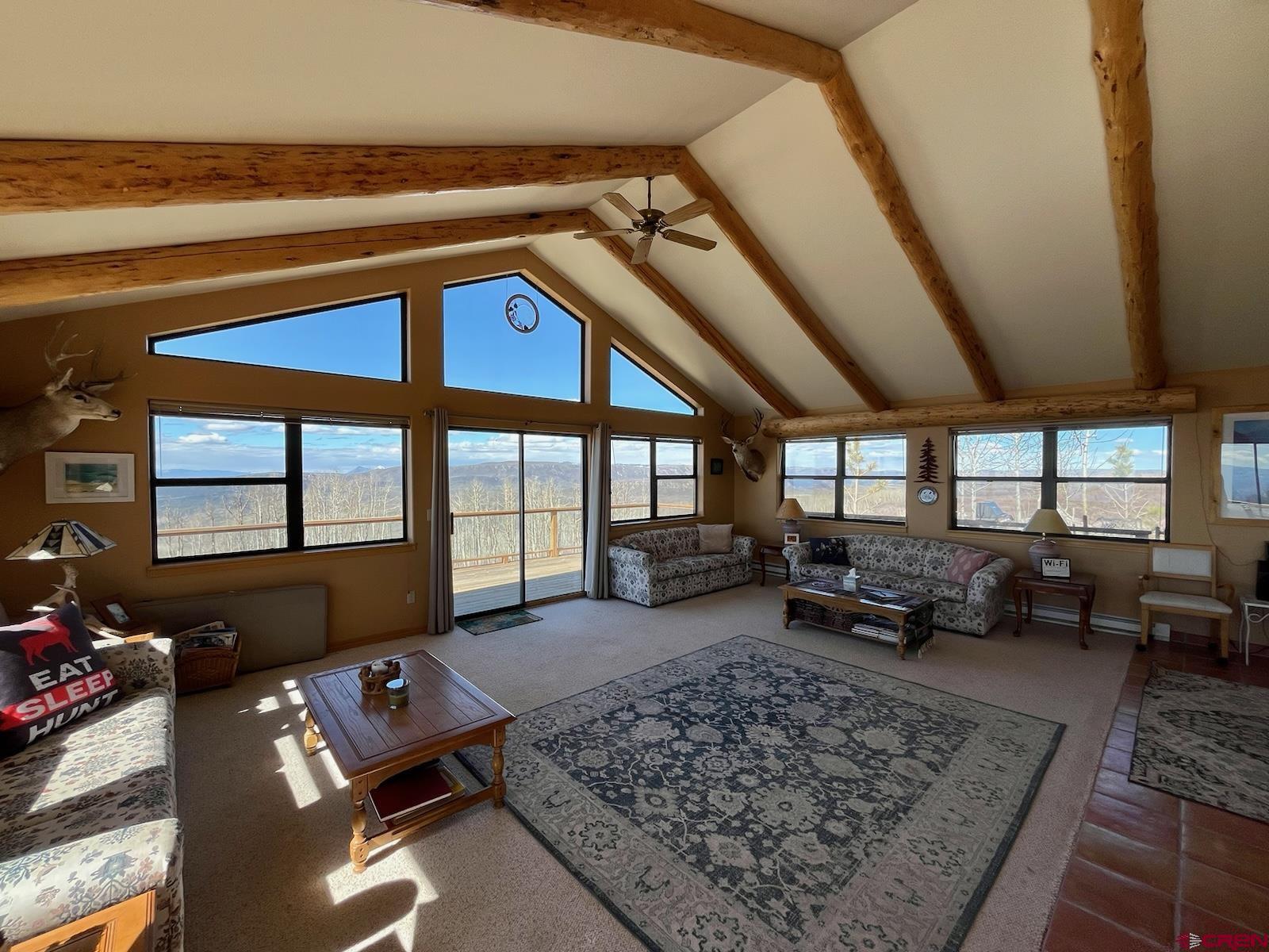 75160 Q72 Road Montrose, CO 81401 - Photo 25 of 33 a living room with furniture or couch and a table