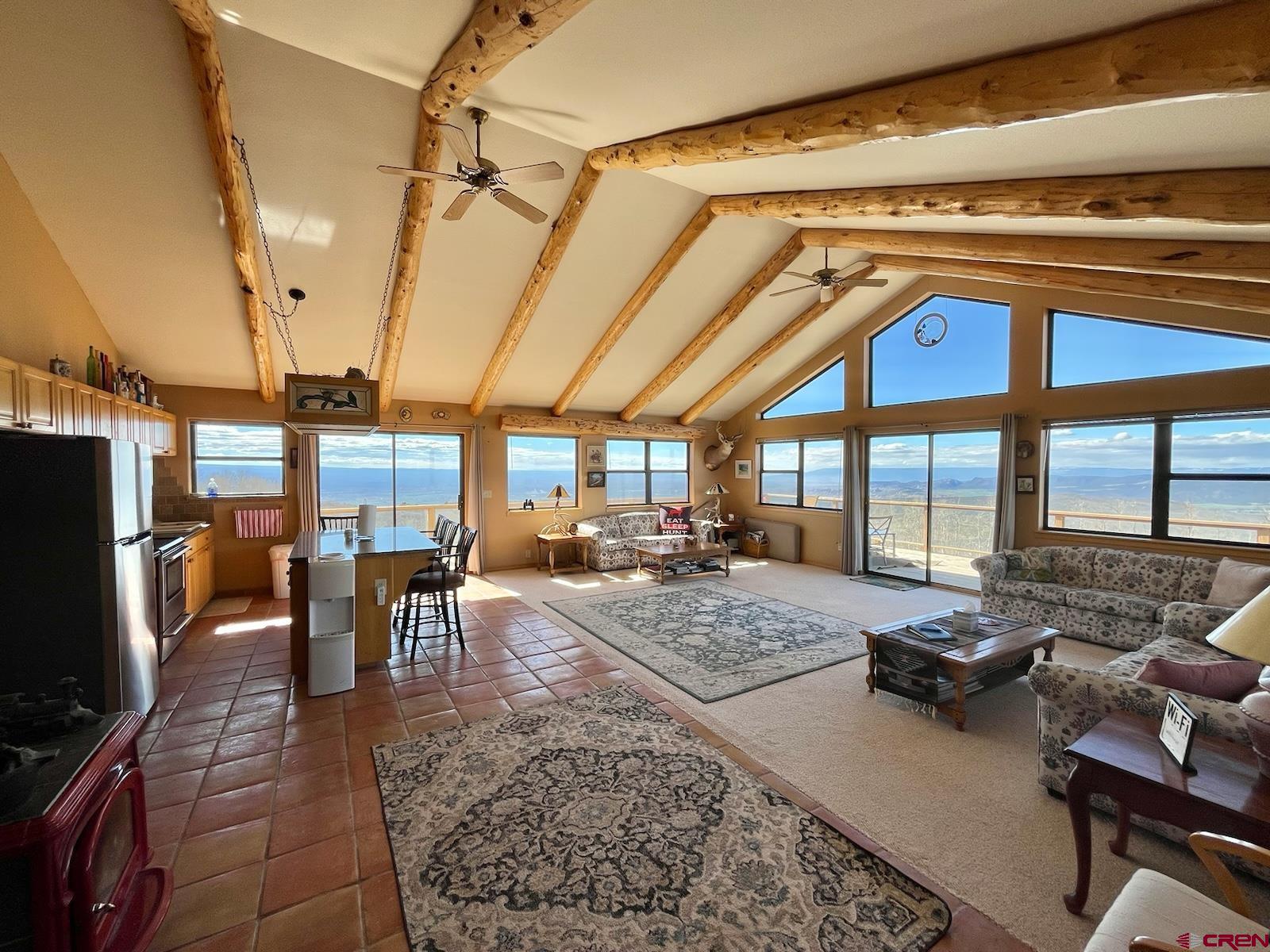 75160 Q72 Road Montrose, CO 81401 - Photo 26 of 33 a view of a dining hall with many windows