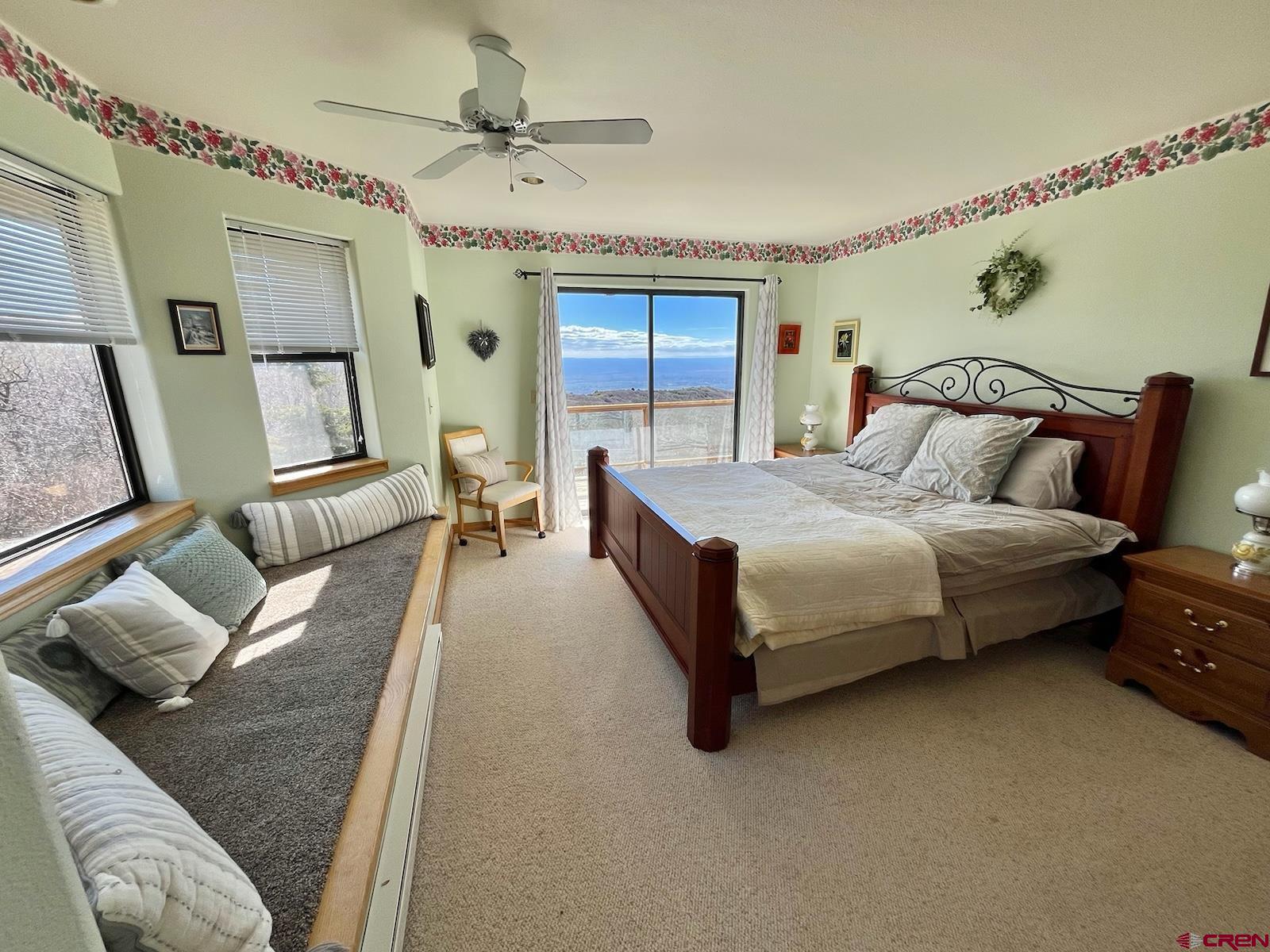 75160 Q72 Road Montrose, CO 81401 - Photo 3 of 33 a bedroom with a bed couch and window