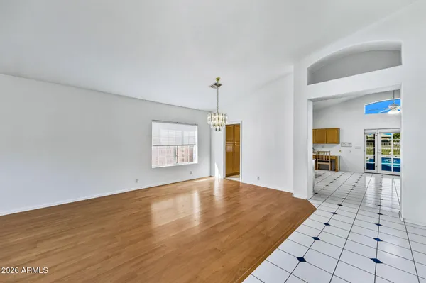 a view of an empty room with a fireplace
