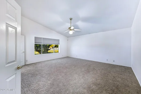 a view of a livingroom with a ceiling fan