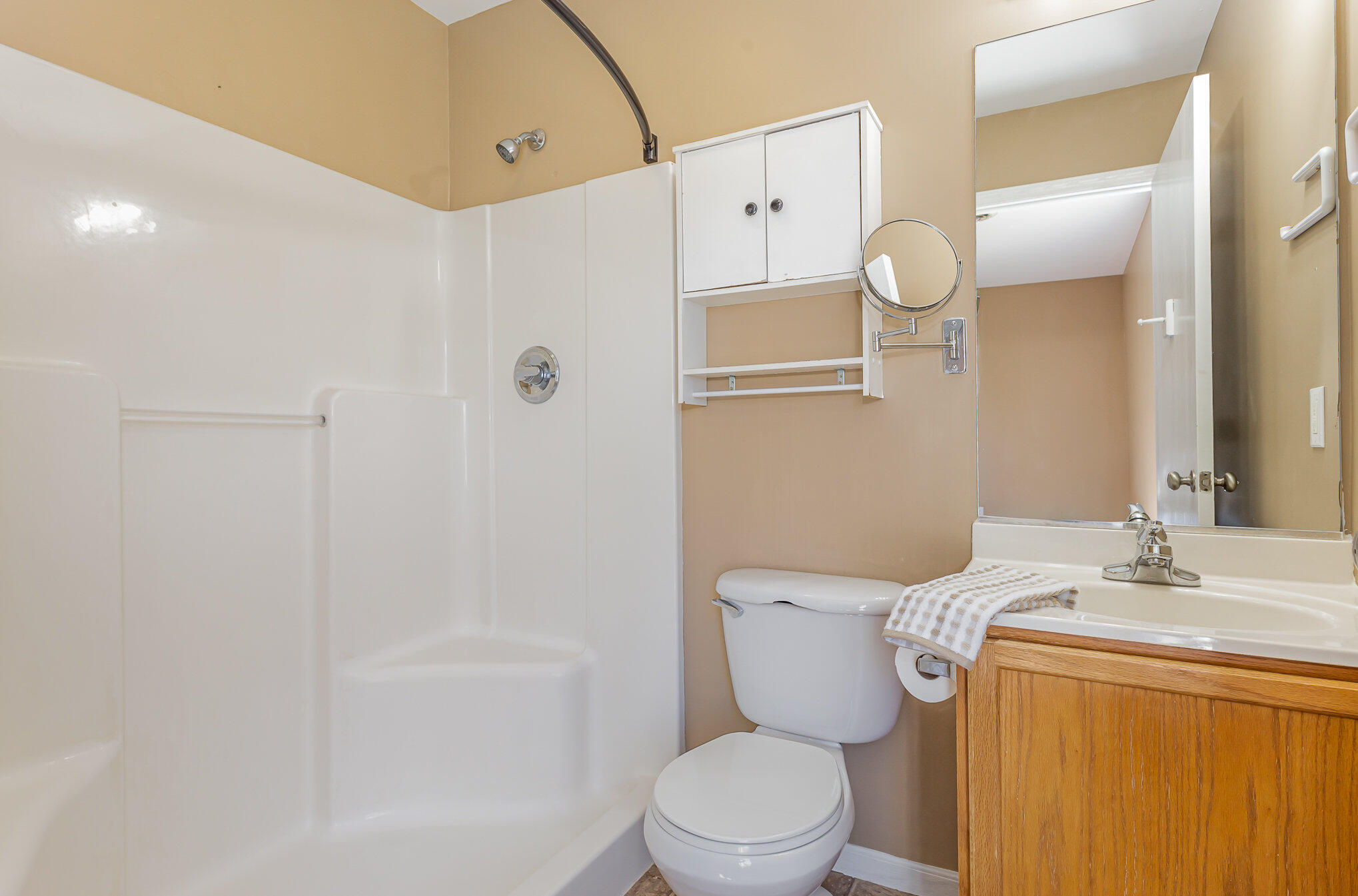 370 South Boo Road Burns Harbor, IN 46304 - Photo 11 of 22 a bathroom with a granite countertop sink toilet and shower