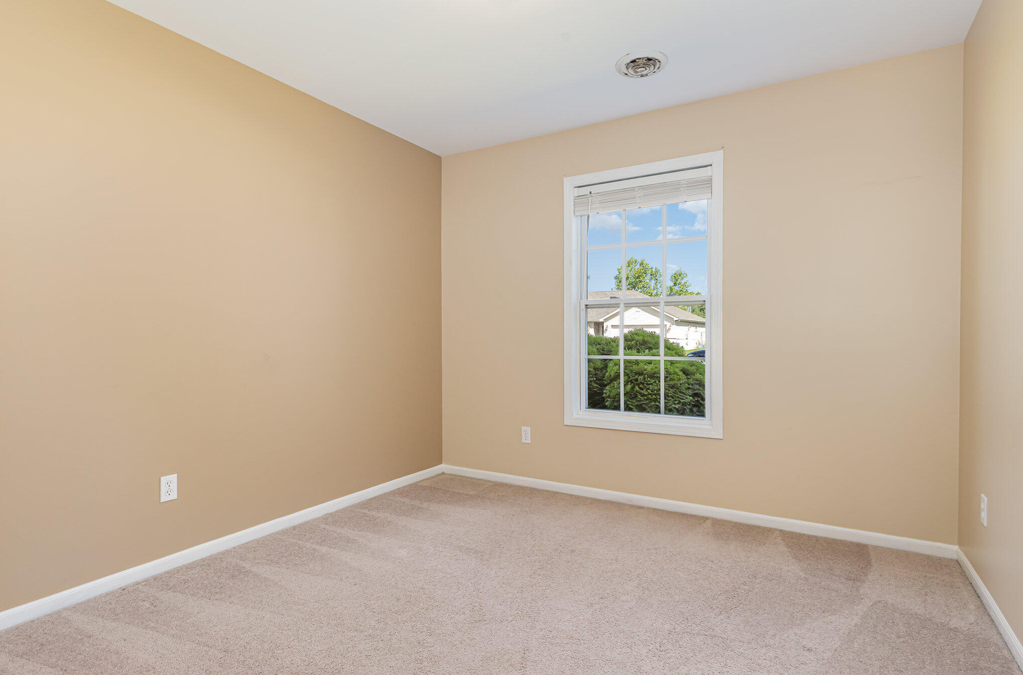 370 South Boo Road Burns Harbor, IN 46304 - Photo 13 of 22 an empty room with a window