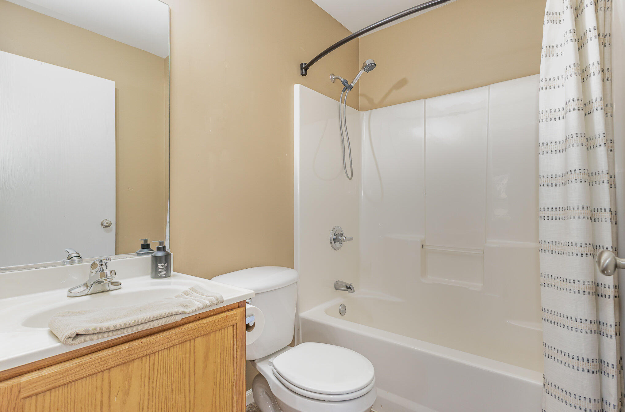 370 South Boo Road Burns Harbor, IN 46304 - Photo 18 of 22 a bathroom with a sink toilet and shower