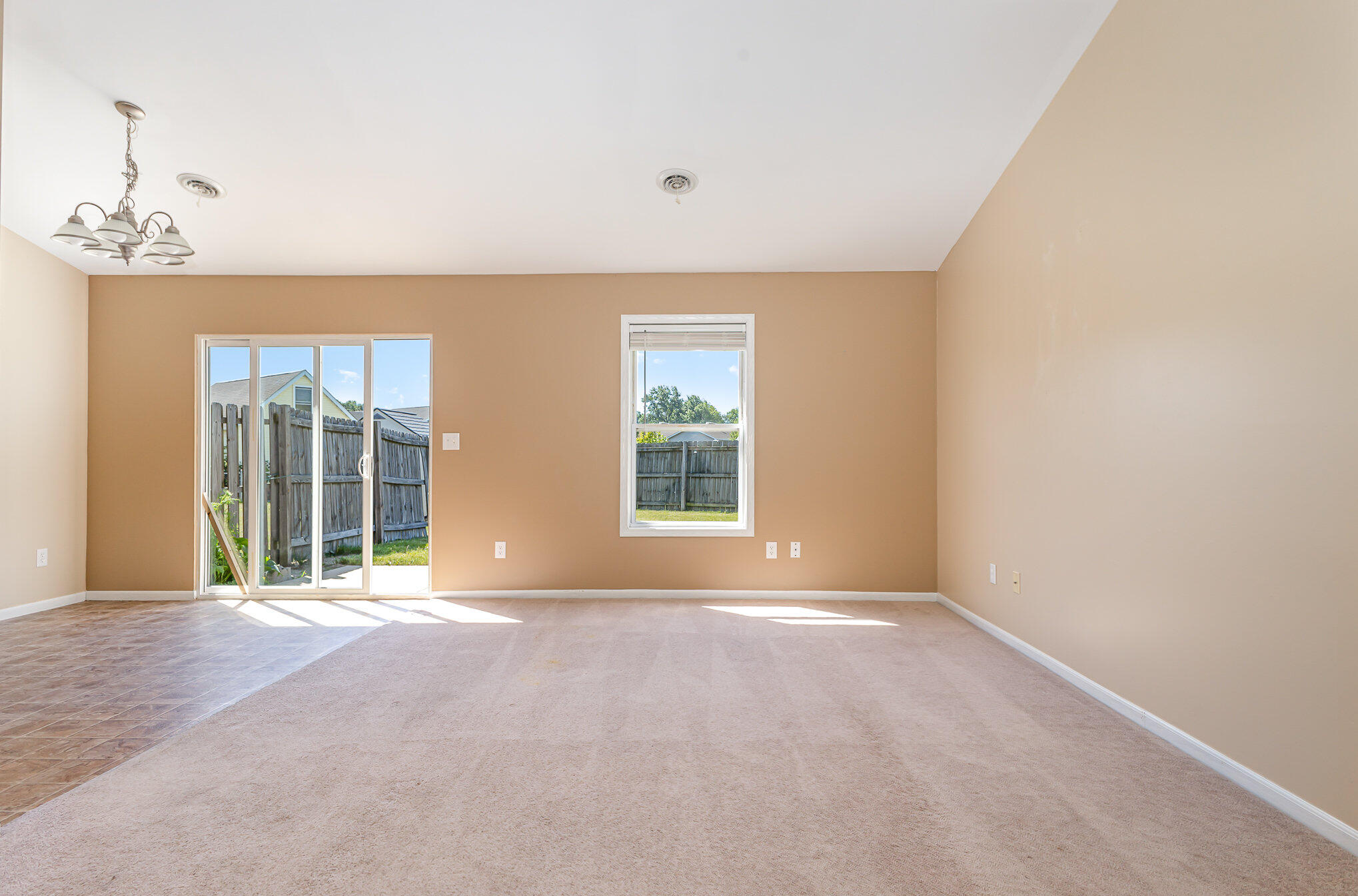 370 South Boo Road Burns Harbor, IN 46304 - Photo 4 of 22 a view of an empty room with a window